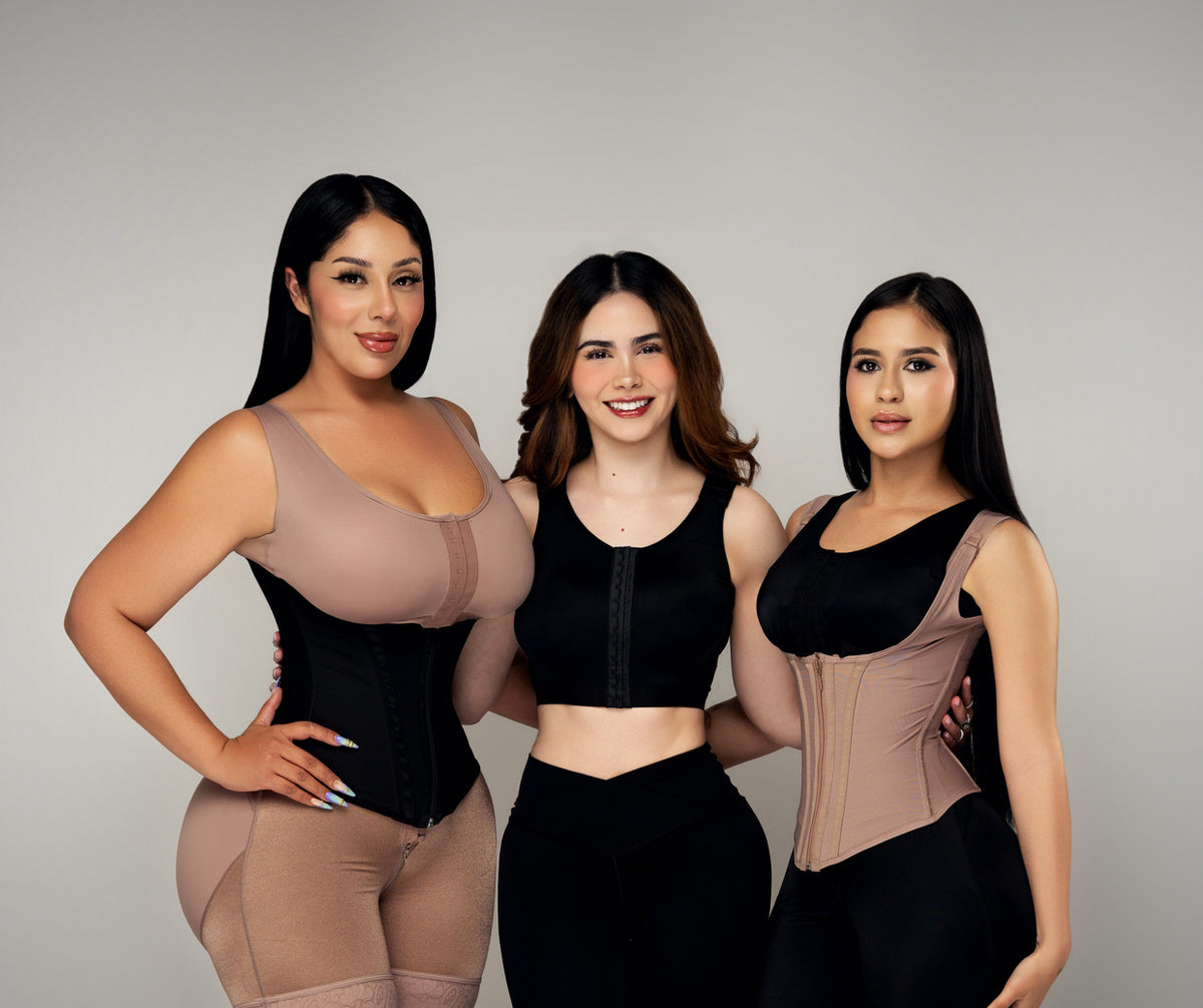 Three women wearing Lipo Fajas waist trainers and a vest over everyday clothes